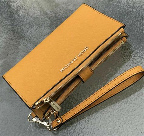 michael kors iphone wallet uk|Michael Kors double zip wallet.